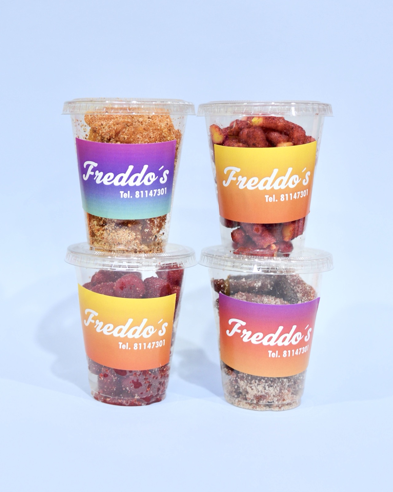 Variedad de vasitos Freddo's con dulces y antojos